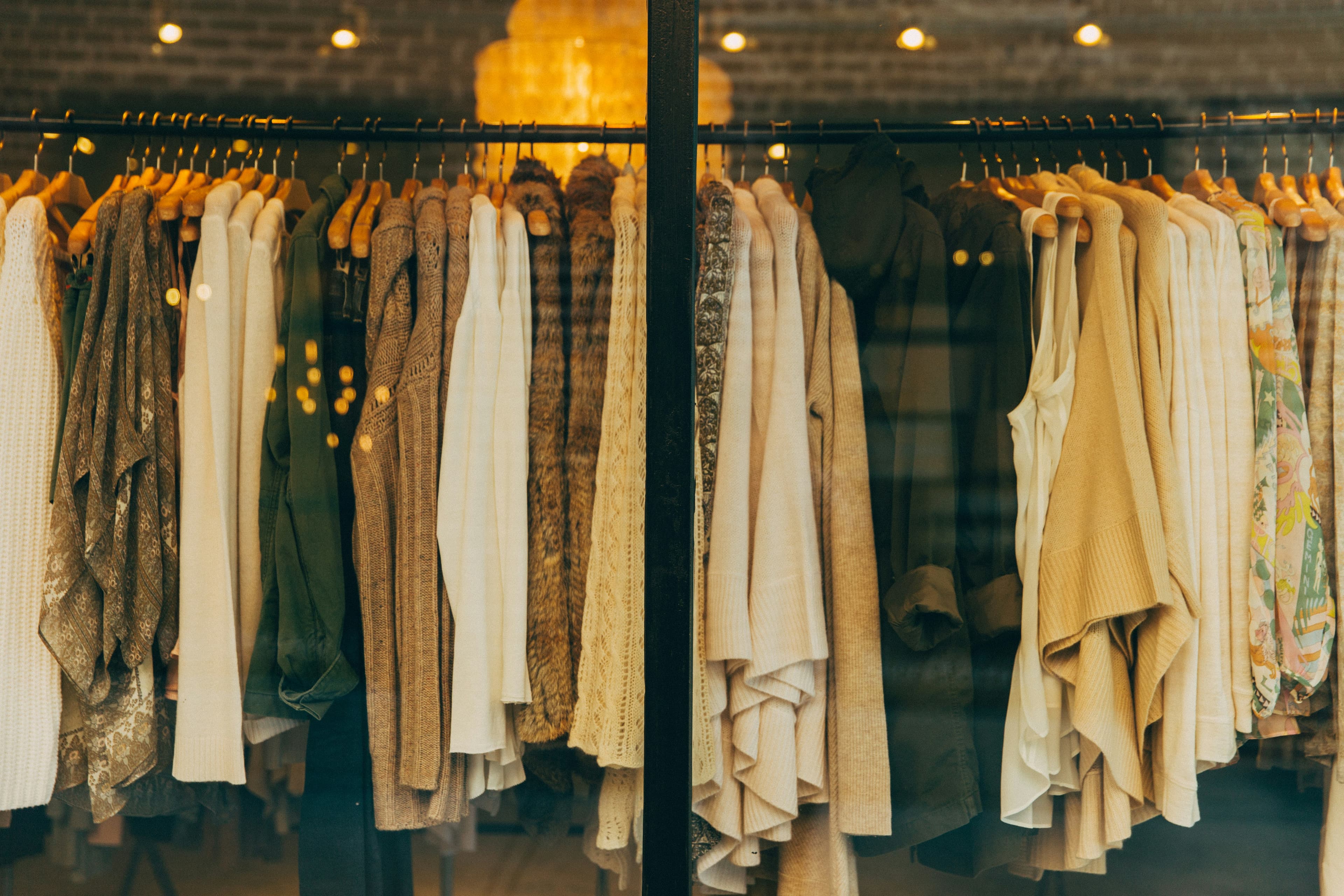 Row of high-quality elegant garments hanging on a rack